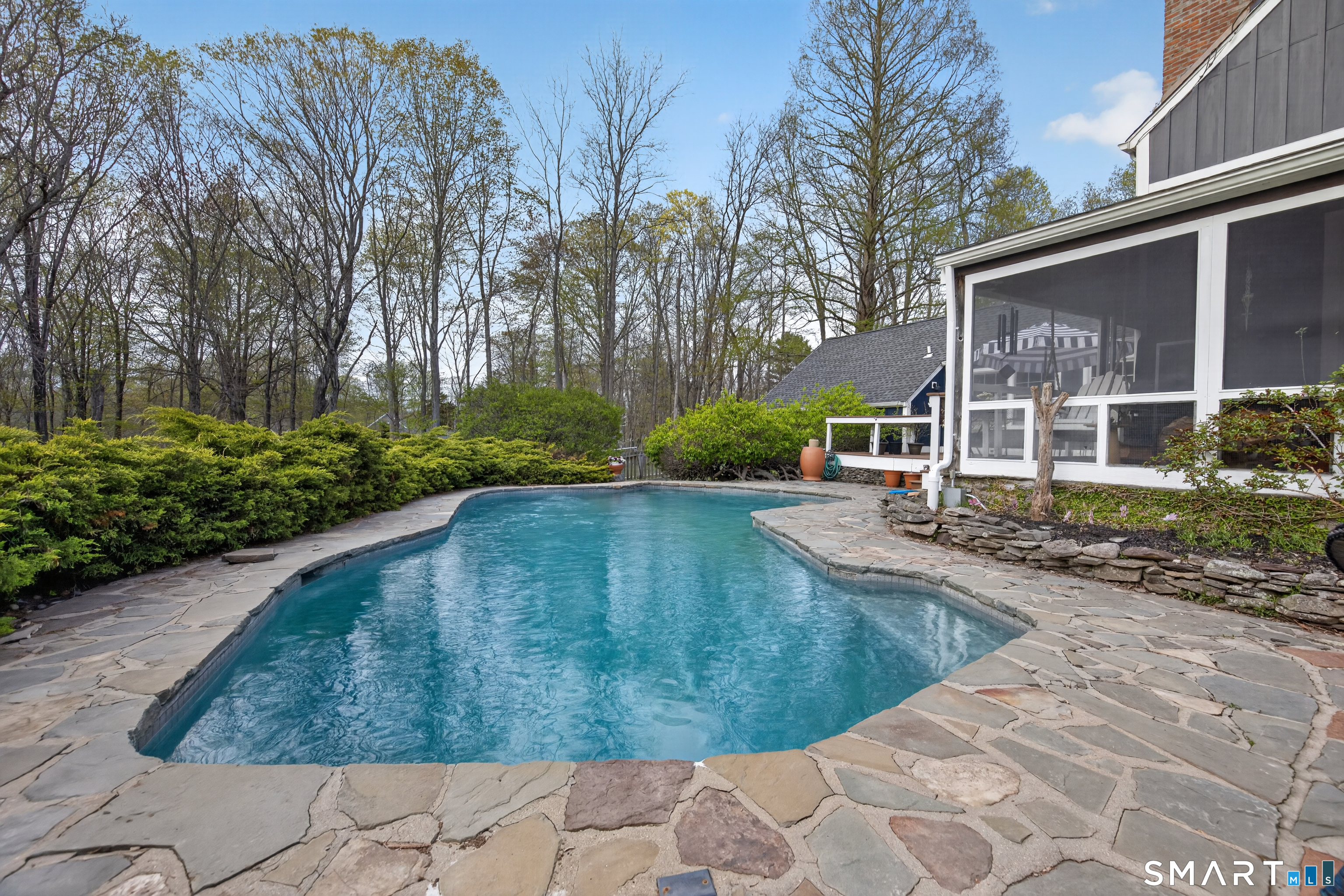 95 Chestnut Hill Road Killingworth, CT 06419 - Photo 35 of 40 Mountain pond design Gunite pool.