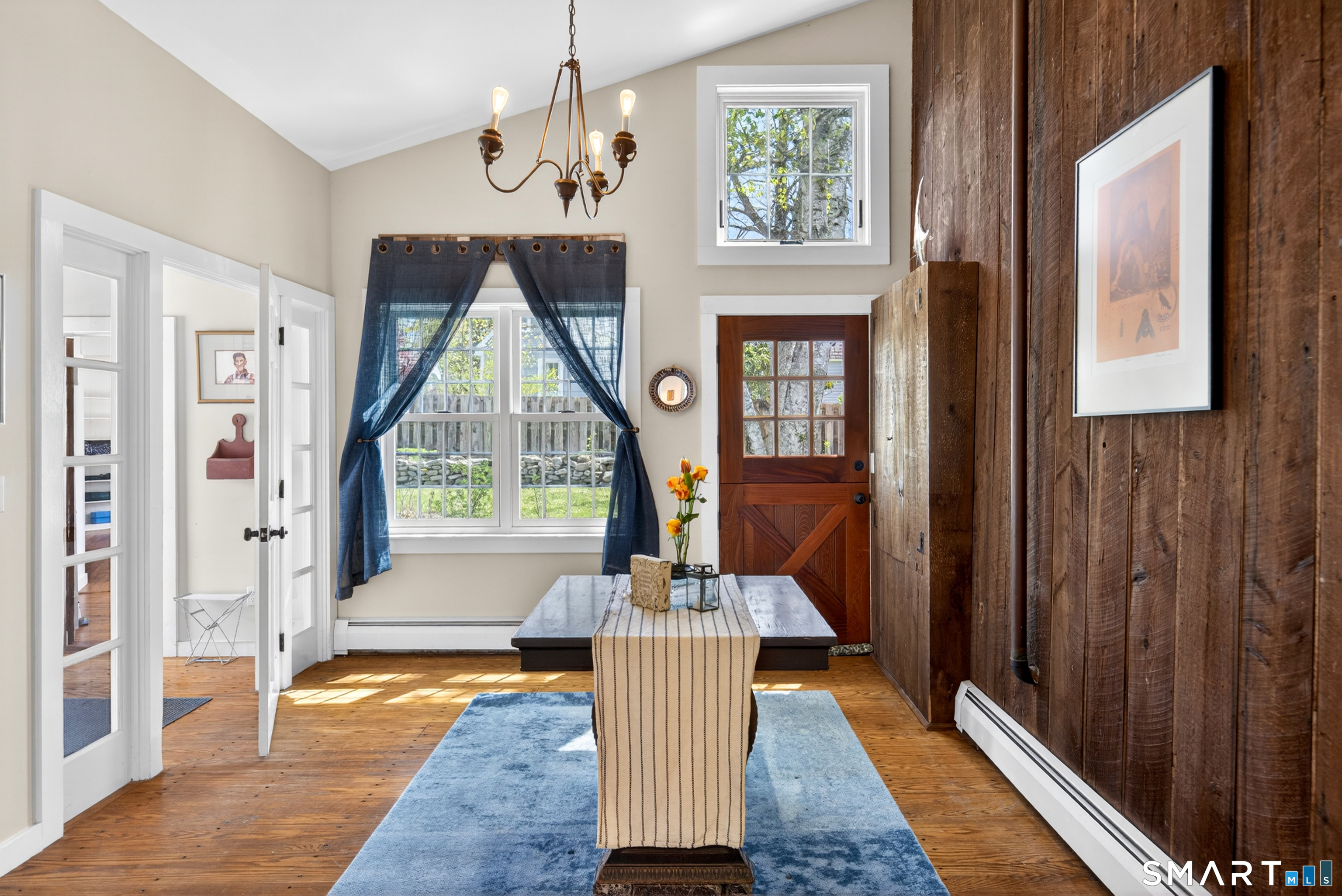 95 Chestnut Hill Road Killingworth, CT 06419 - Photo 5 of 40 Gracious entry with vaulted ceilings leads to bedroom suites and the main living area.