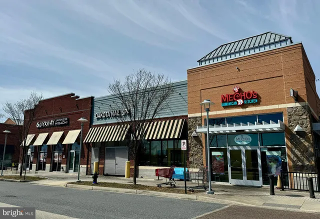 a view of a building with a street