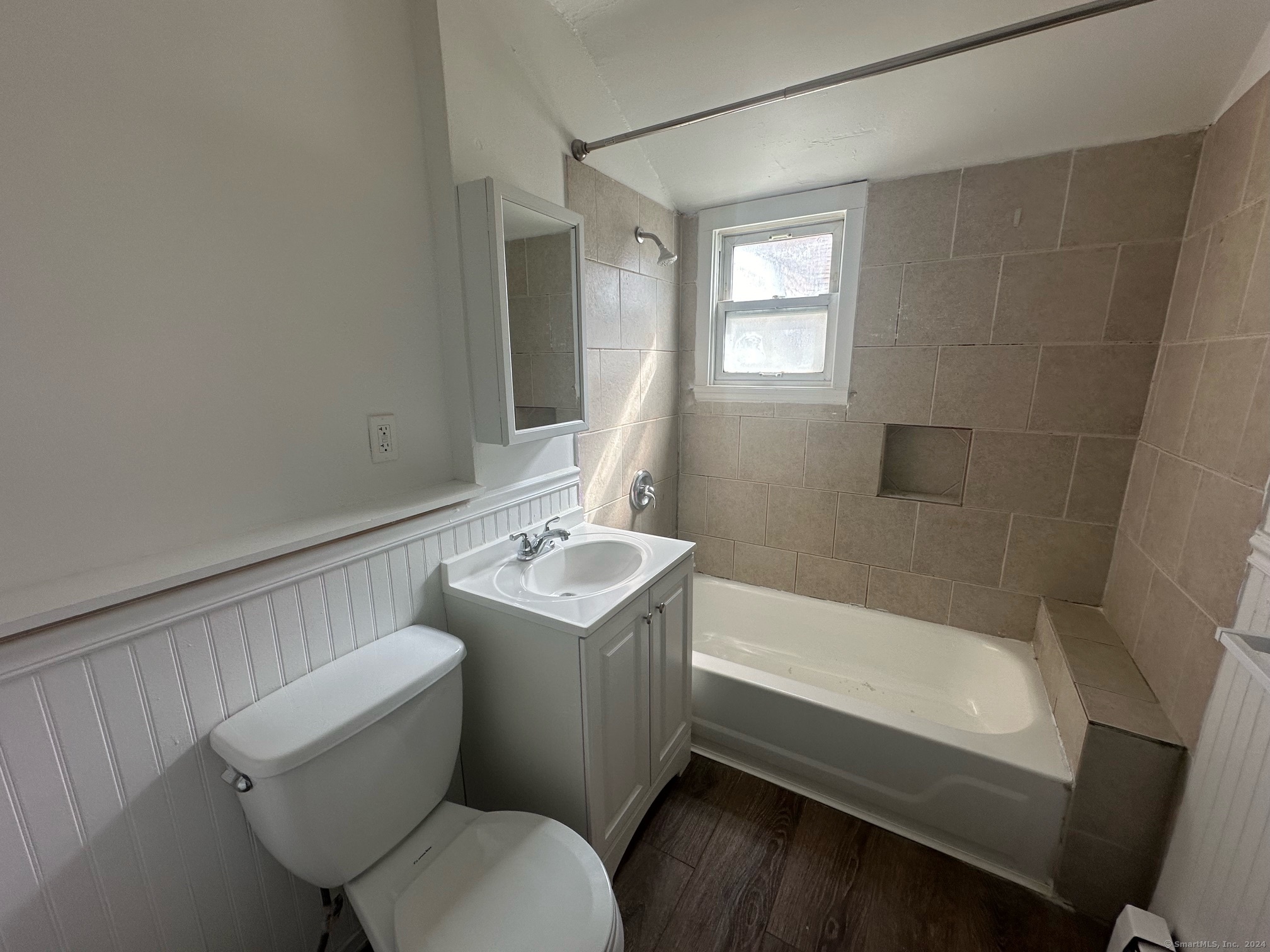 40 Vine Street, Unit 3 Bridgeport, CT 06604 - Photo 6 of 14 a bathroom with a sink toilet and shower