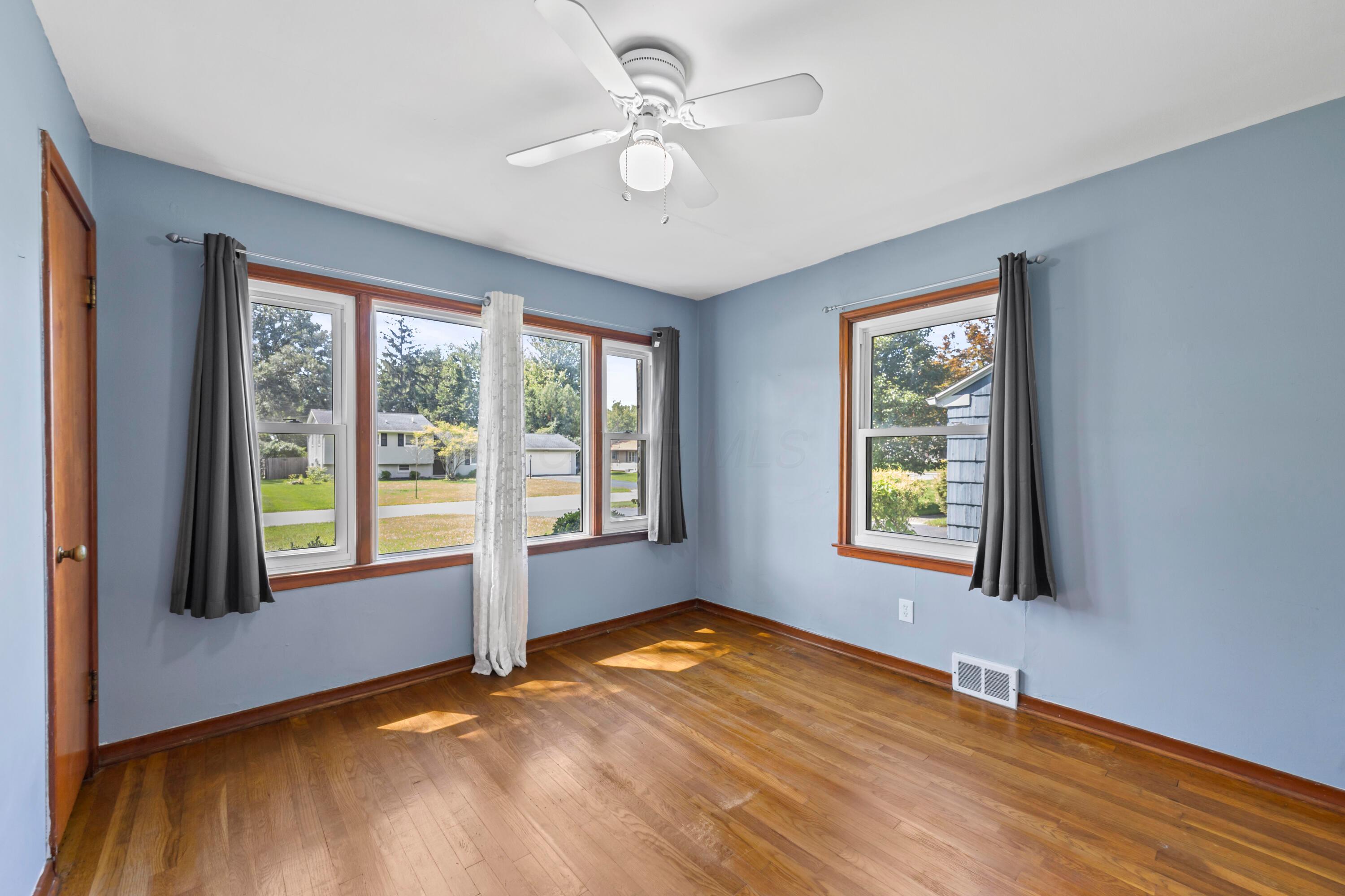 3260 Avalon Road Columbus, OH 43221 - Photo 23 of 46 Hardwood flooring, ceiling fan with integrated lighting, multiple windows