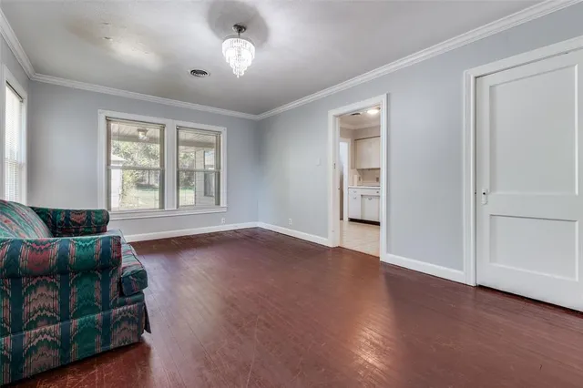 a view of livingroom with furniture wooden floor and window