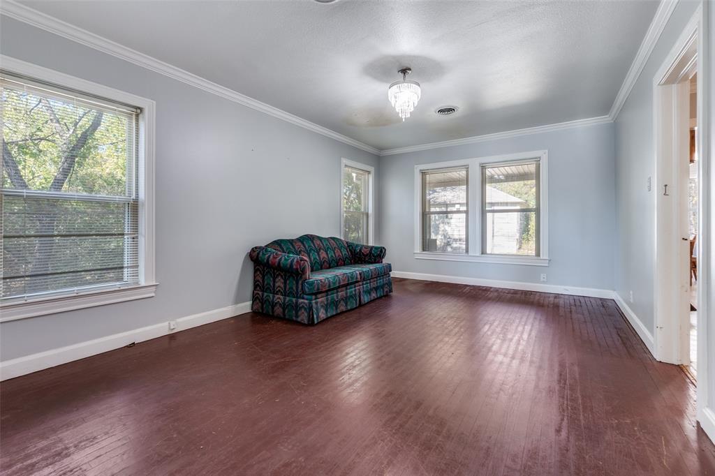 4501-4503 Highview Street Cockrell Hill, TX 75211 - Photo 6 of 24 a living room with furniture and a window