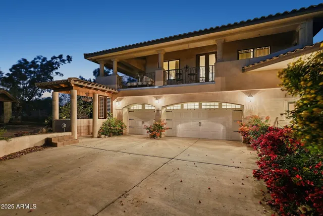a bedroom with a bed and a tv on table