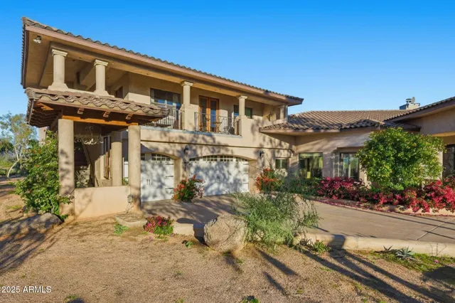 a bedroom with a bed and a table