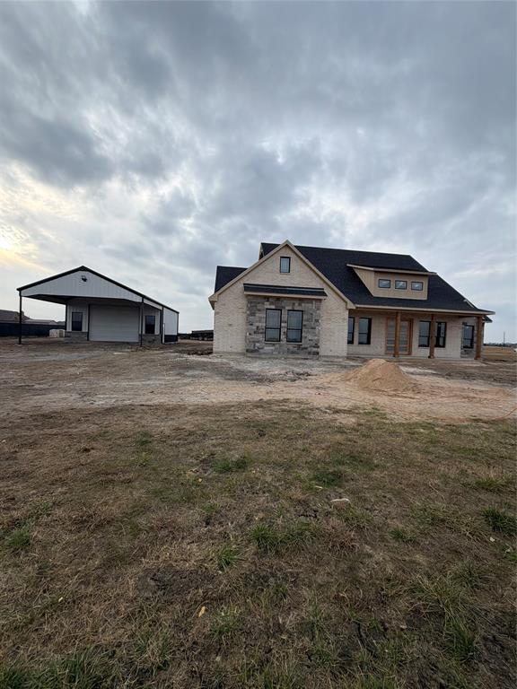 556 Alondrita Street Celeste, TX 75423 - Photo 3 of 7 a large white building with a big yard