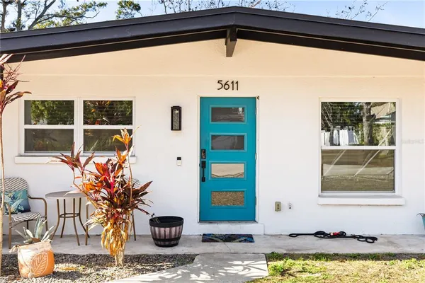 a front view of a house with outdoor space