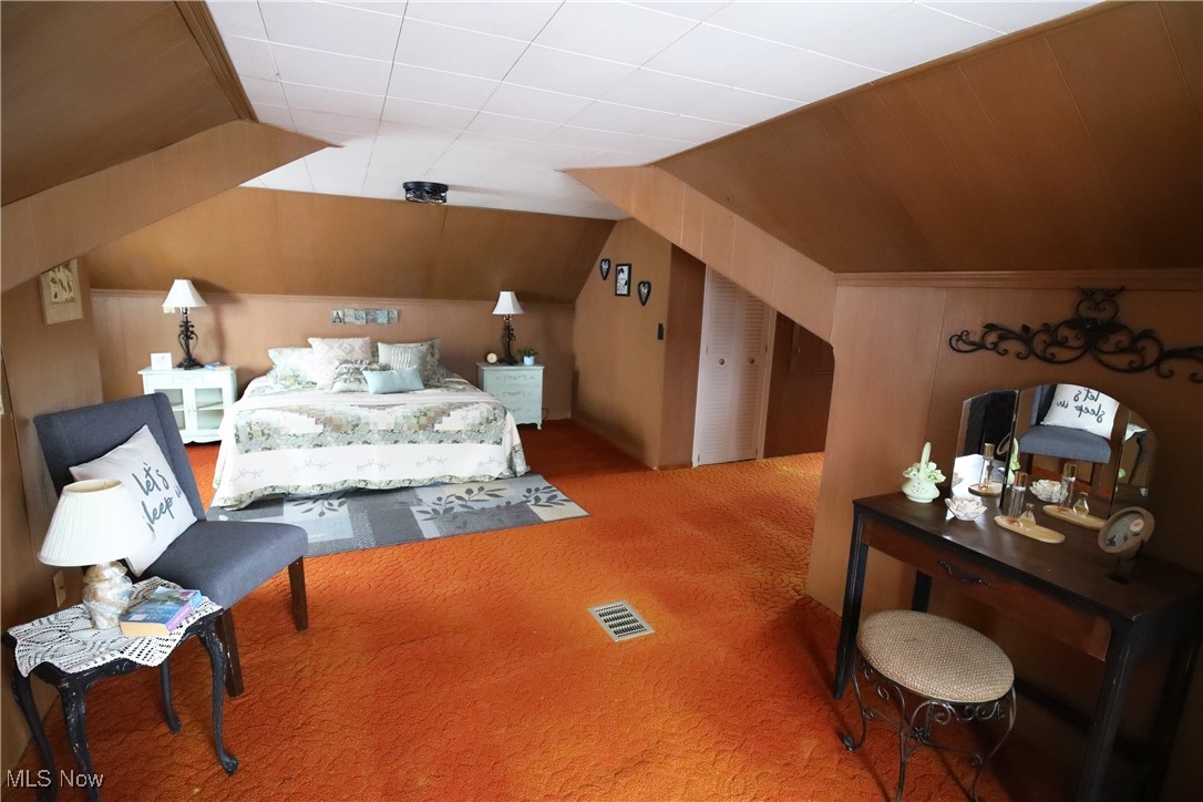 1344 Lander Road Cleveland, OH 44124 - Photo 29 of 49 Bedroom featuring carpet floors and vaulted ceiling