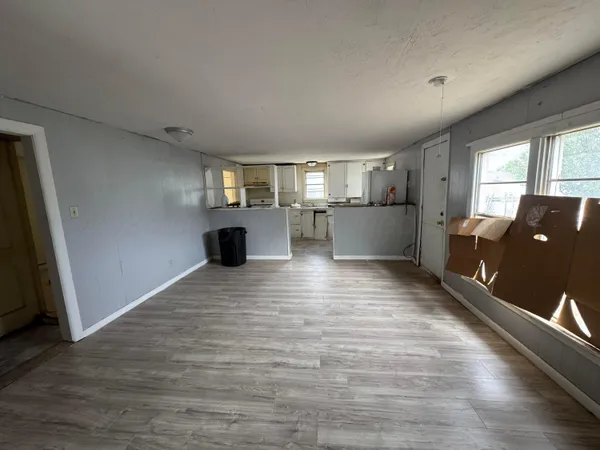 a view of kitchen and windows