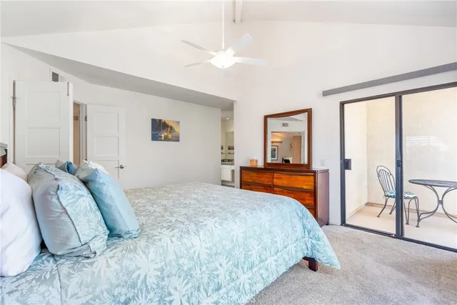 a room with a bed and a sink