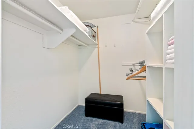 a view of a chairs and table in patio