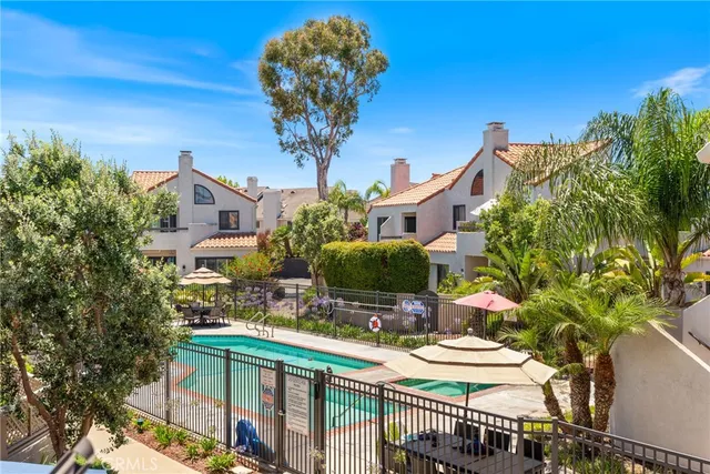 a view of balcony with furniture
