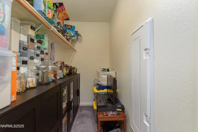 a children room with furniture and toys
