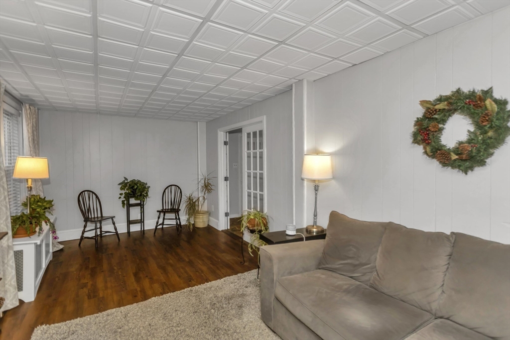 231 Wheatland Avenue Chicopee, MA 01020 - Photo 12 of 36 a living room with furniture