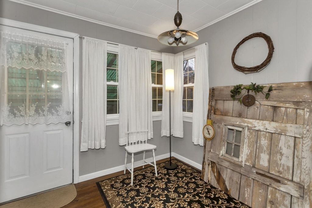231 Wheatland Avenue Chicopee, MA 01020 - Photo 15 of 36 a bathroom with a sink a mirror and a shower