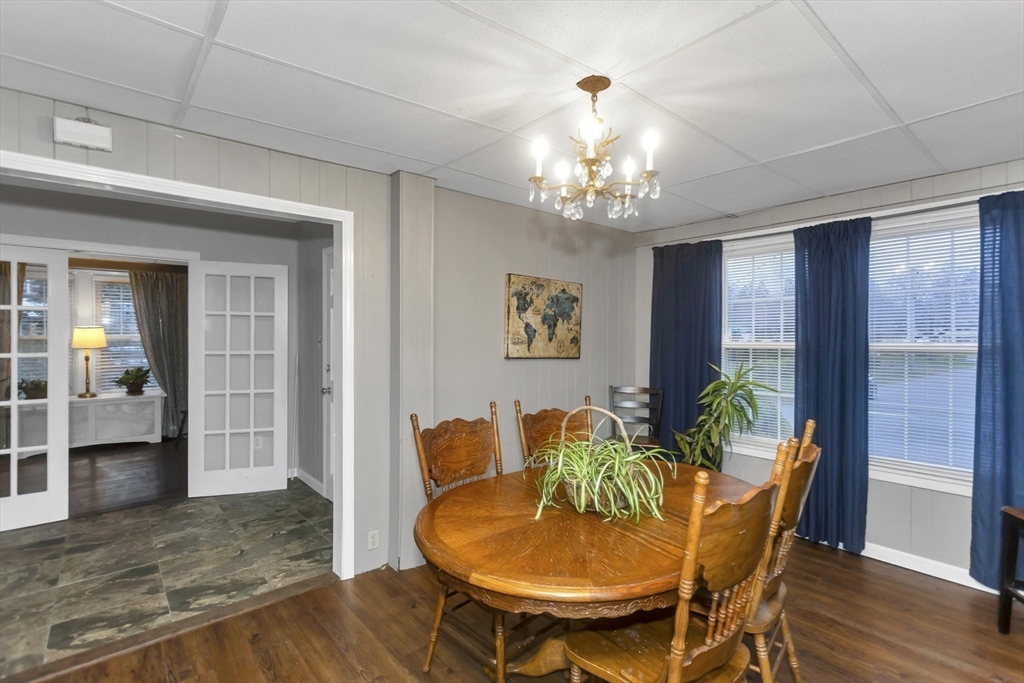 231 Wheatland Avenue Chicopee, MA 01020 - Photo 6 of 36 a view of a dining room with furniture window and wooden floor