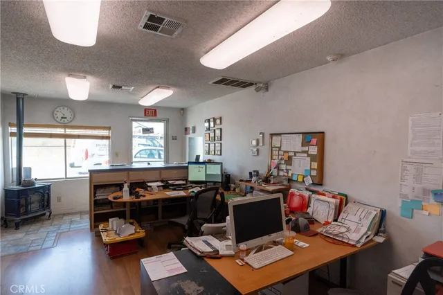 front view of a house with a garden