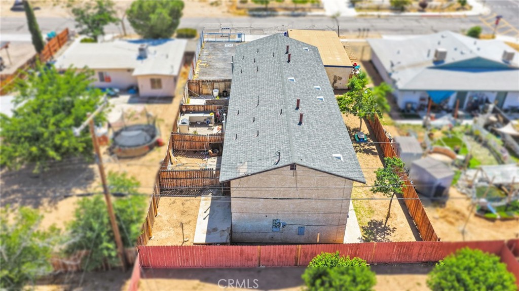 18130 Casaba Road Adelanto, CA 92301 - Photo 2 of 13 an aerial view of residential houses with outdoor space