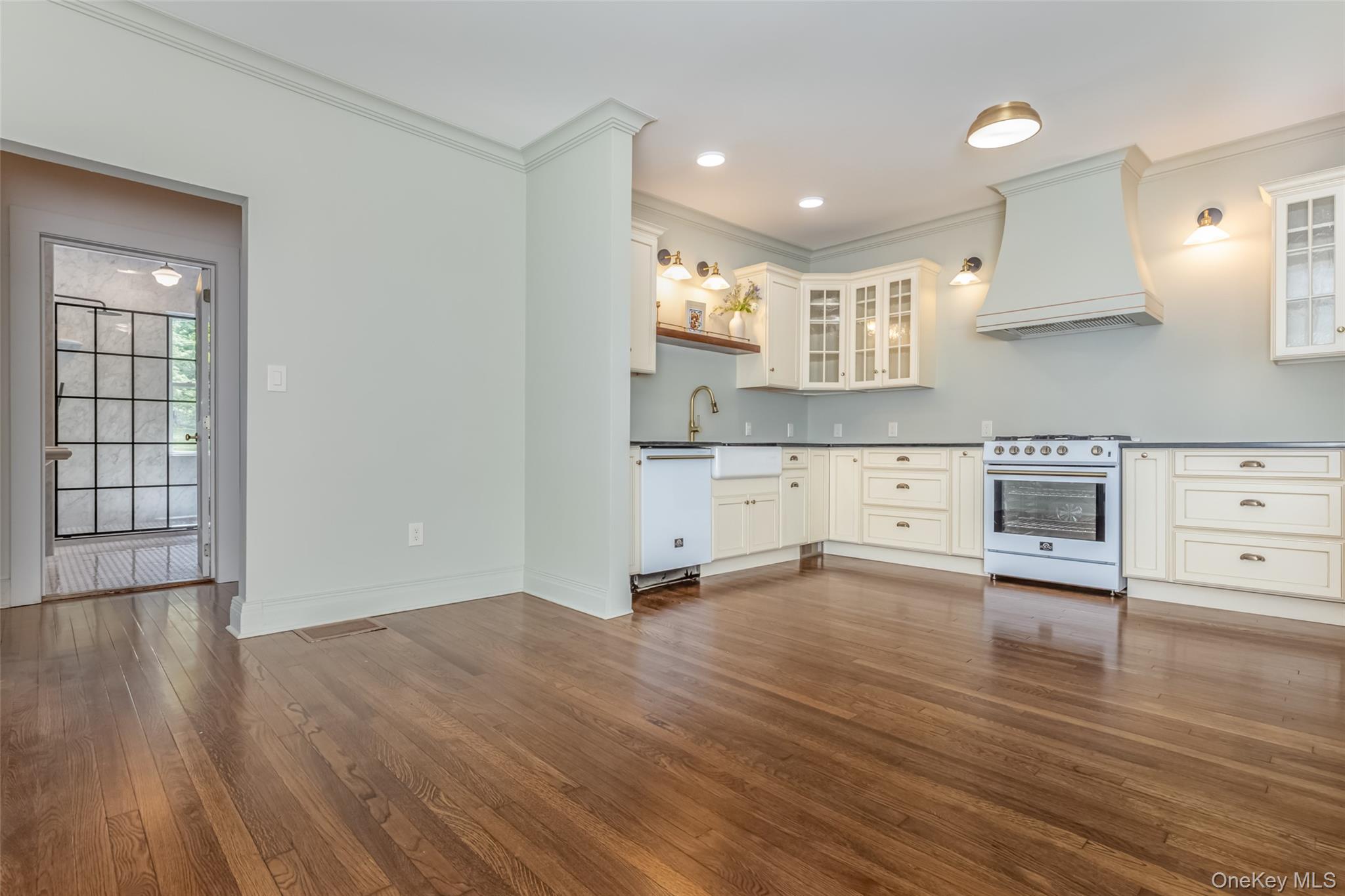405 Vista Maria Road Cragsmoor, NY 12566 - Photo 16 of 35 a view of kitchen and sink with wooden floor