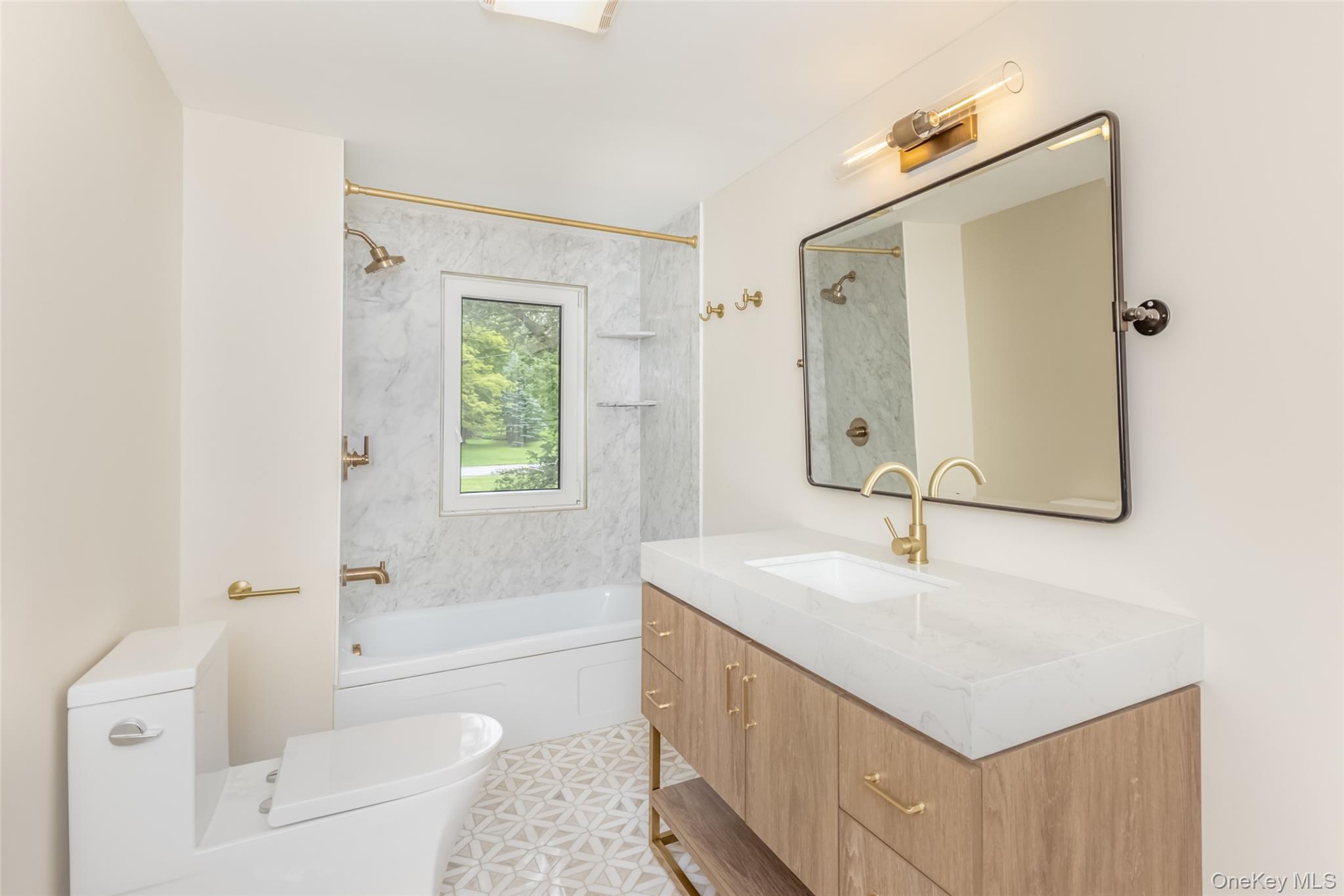 405 Vista Maria Road Cragsmoor, NY 12566 - Photo 26 of 35 a bathroom with a granite countertop sink toilet and shower