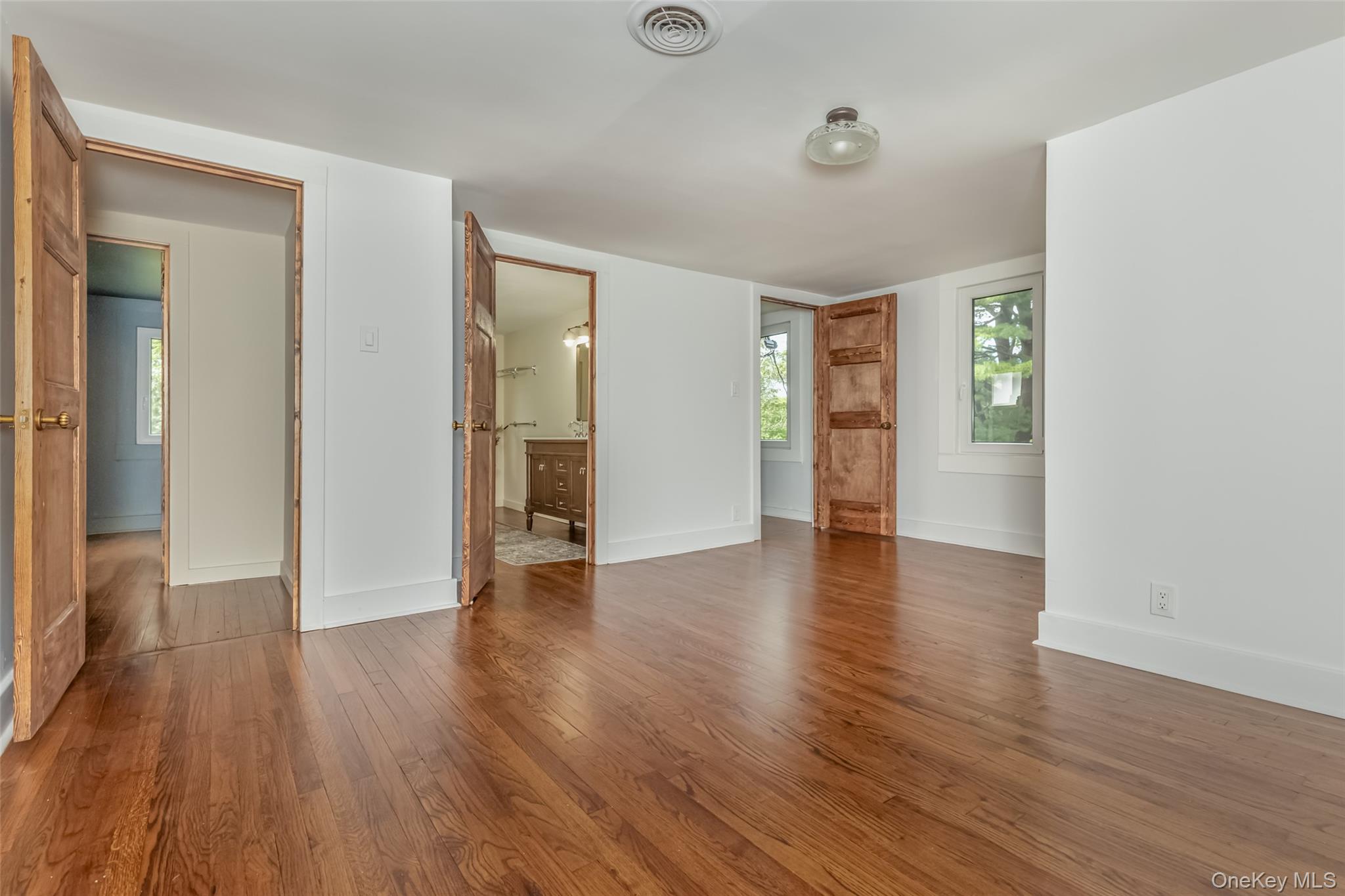 405 Vista Maria Road Cragsmoor, NY 12566 - Photo 27 of 35 a view of an empty room with wooden floor