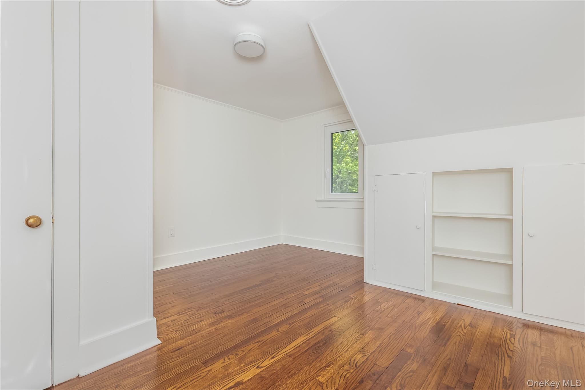 405 Vista Maria Road Cragsmoor, NY 12566 - Photo 31 of 35 a view of empty room with wooden floor and fan