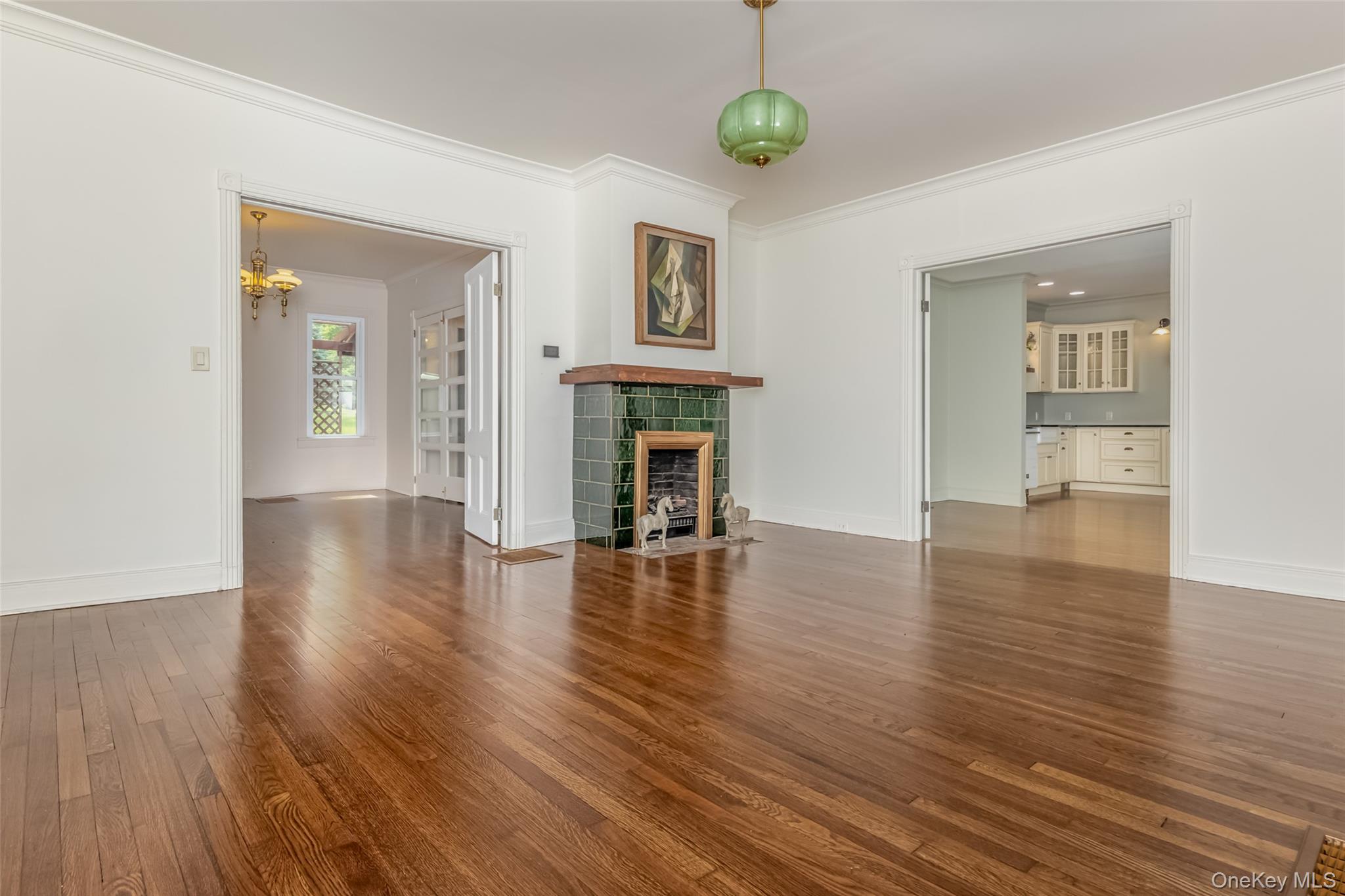 405 Vista Maria Road Cragsmoor, NY 12566 - Photo 10 of 35 a view of an empty room with window and wooden floor