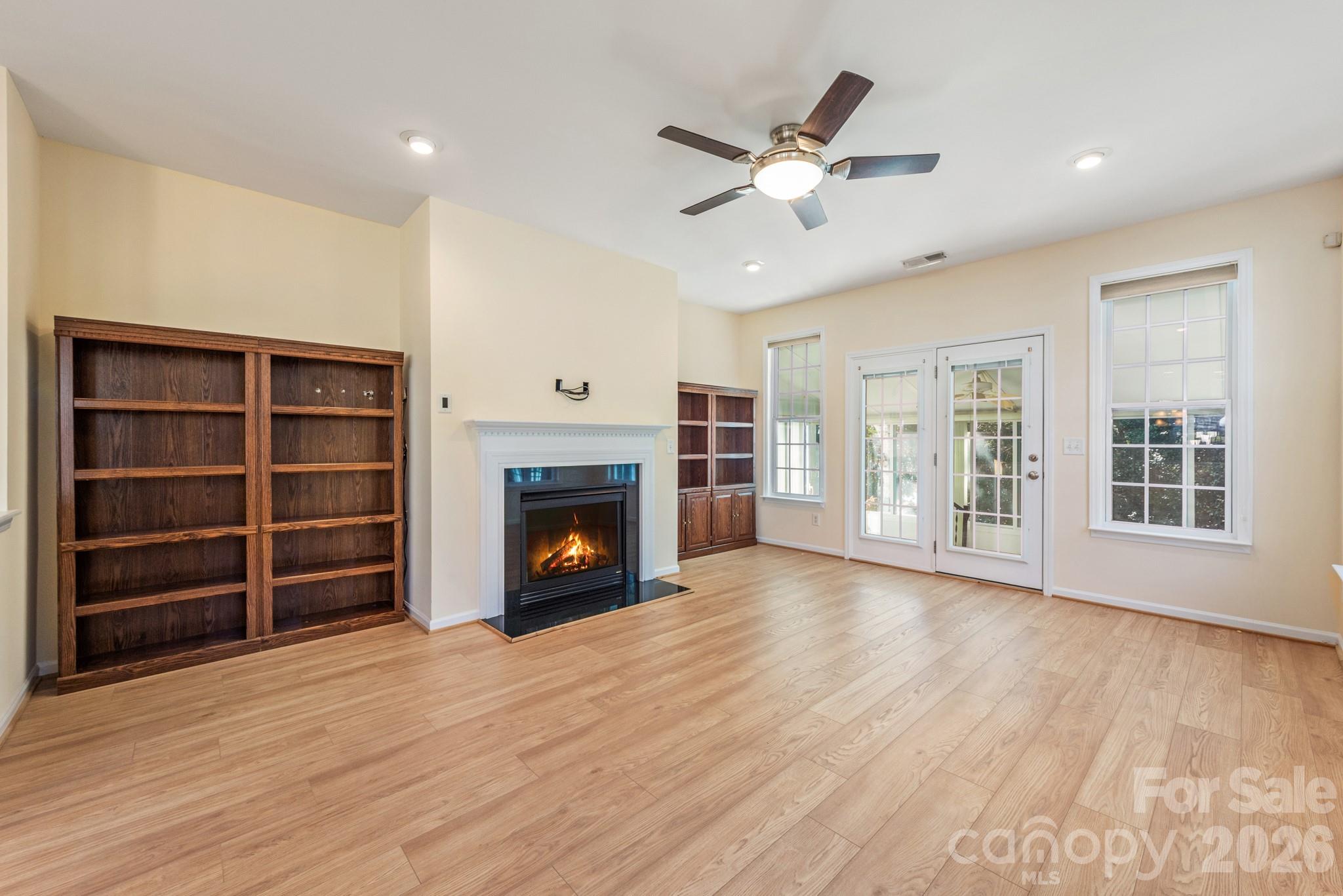 2013 Citron Avenue Fort Mill, SC 29708 - Photo 13 of 34 a view of an empty room with a fireplace and a window