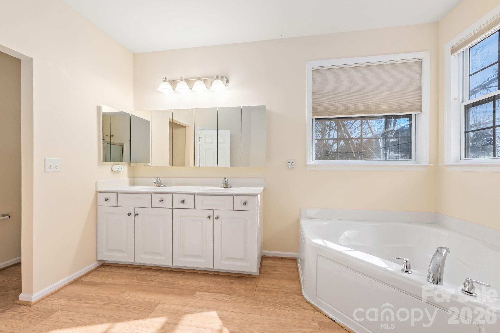 2013 Citron Avenue Fort Mill, SC 29708 - Photo 21 of 34 a spacious bathroom with a tub sink and mirror