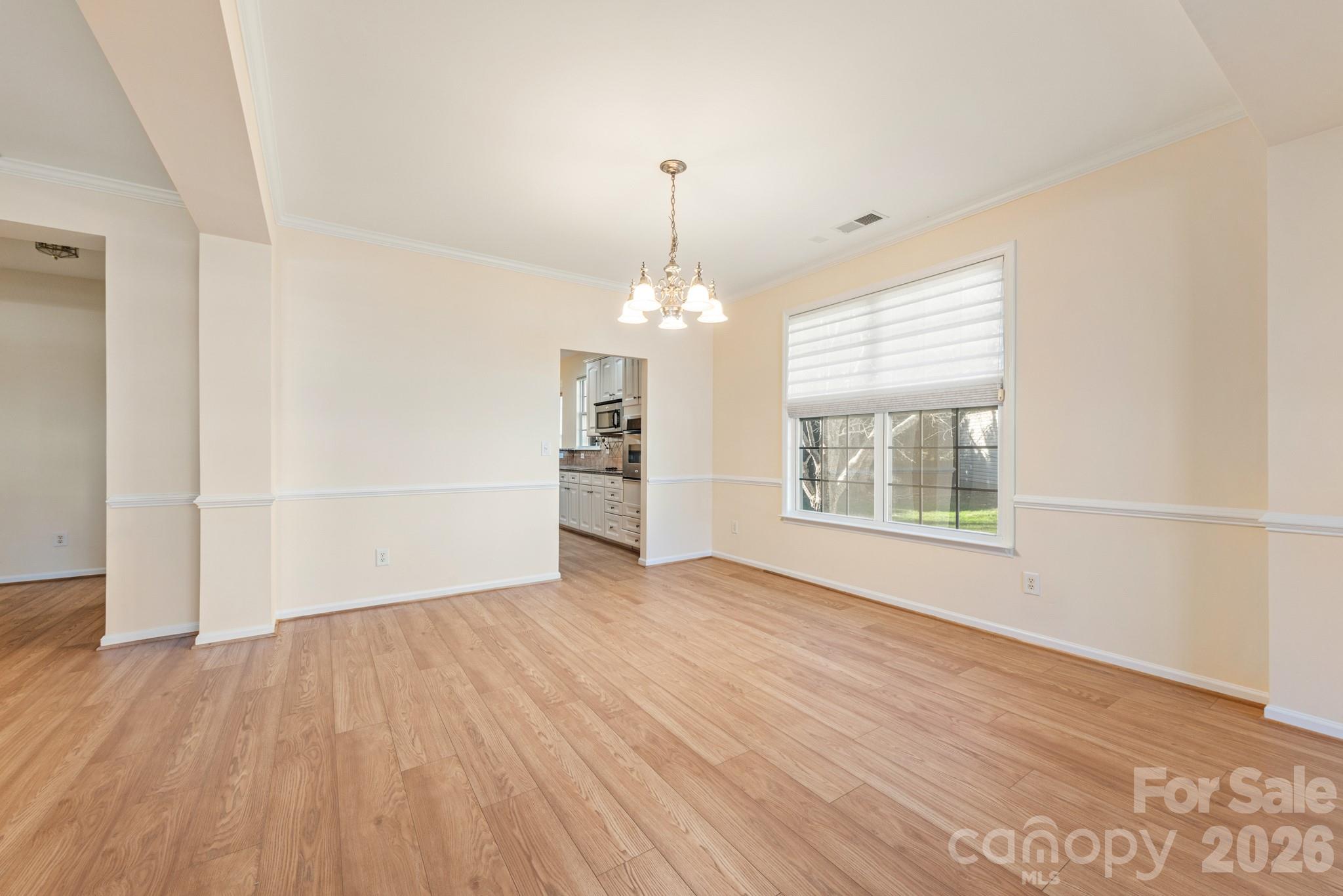 2013 Citron Avenue Fort Mill, SC 29708 - Photo 6 of 34 wooden floor in an empty room with a window