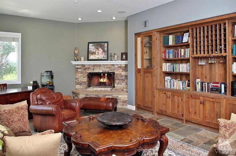 12428 Palmer Drive Moorpark, CA 93021 - Photo 14 of 42 a living room with furniture and a fireplace