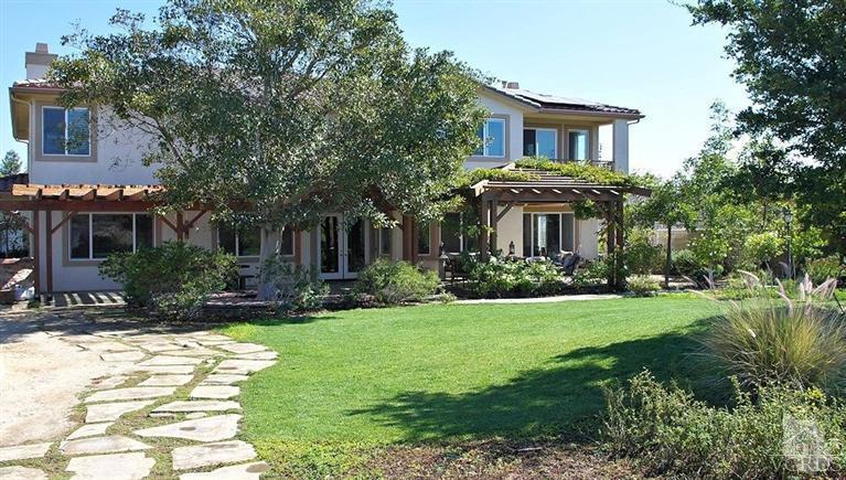 12428 Palmer Drive Moorpark, CA 93021 - Photo 35 of 42 a front view of a house with a yard