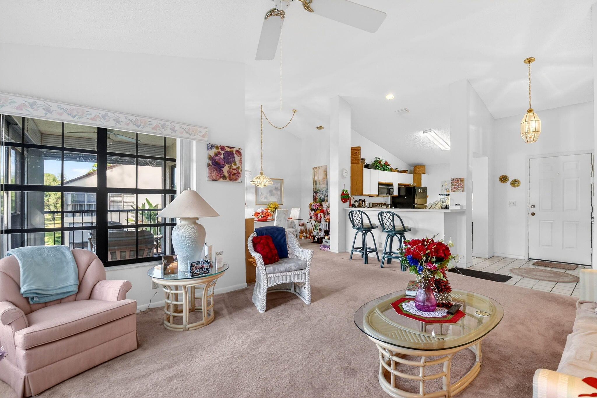 3227 Perimeter Drive Greenacres, FL 33467 - Photo 11 of 57 a living room with furniture and a potted plants