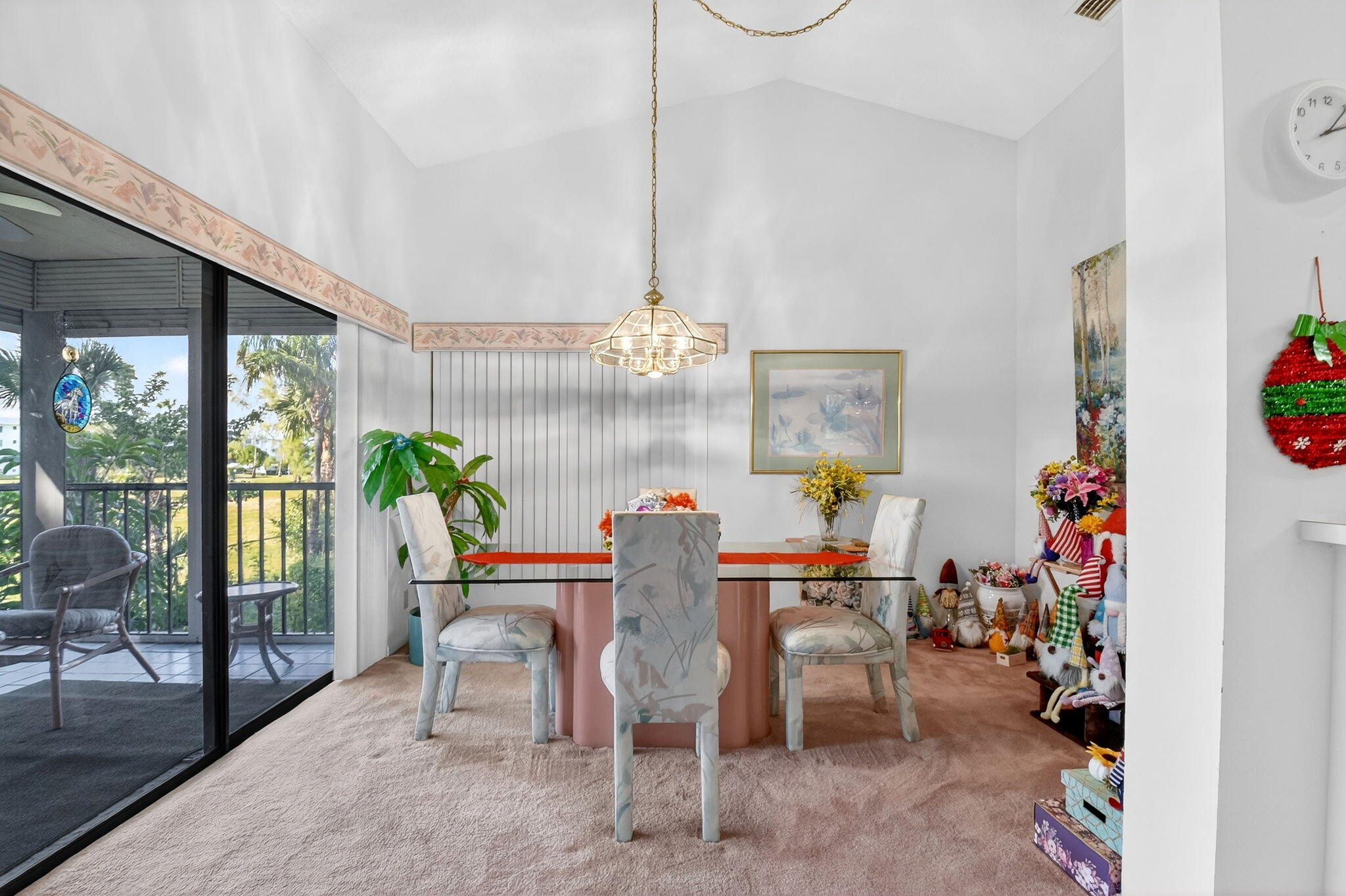 3227 Perimeter Drive Greenacres, FL 33467 - Photo 12 of 57 a dining room with furniture and a floor to ceiling window