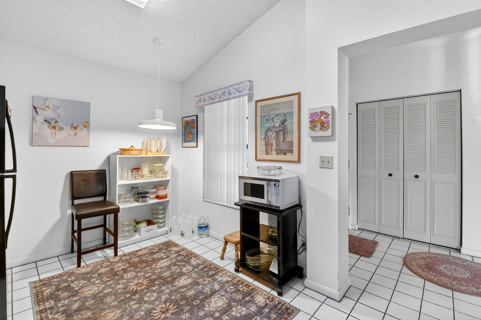 3227 Perimeter Drive Greenacres, FL 33467 - Photo 21 of 57 a bedroom with furniture and a window