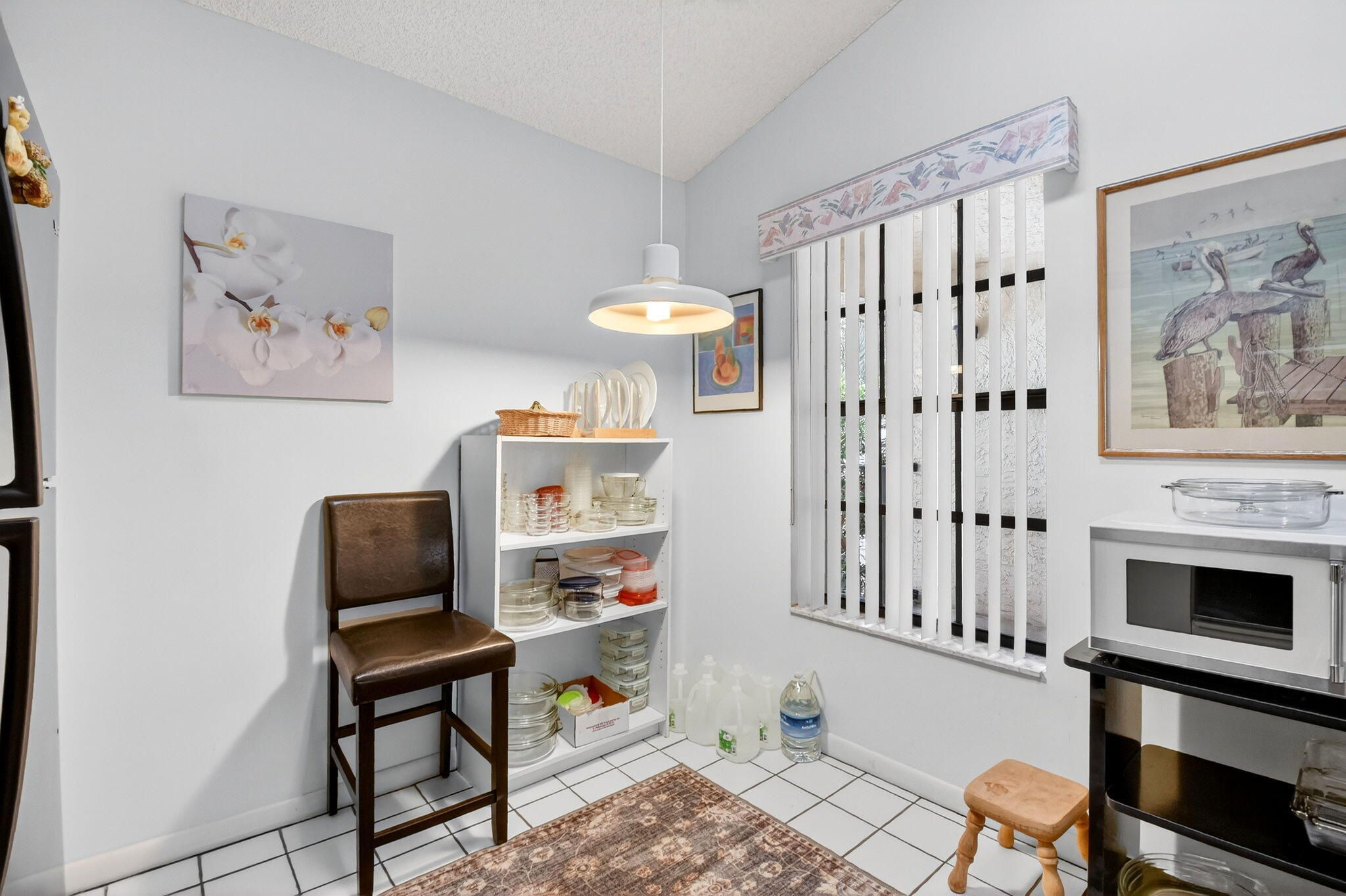 3227 Perimeter Drive Greenacres, FL 33467 - Photo 22 of 57 a living room with furniture and a fireplace