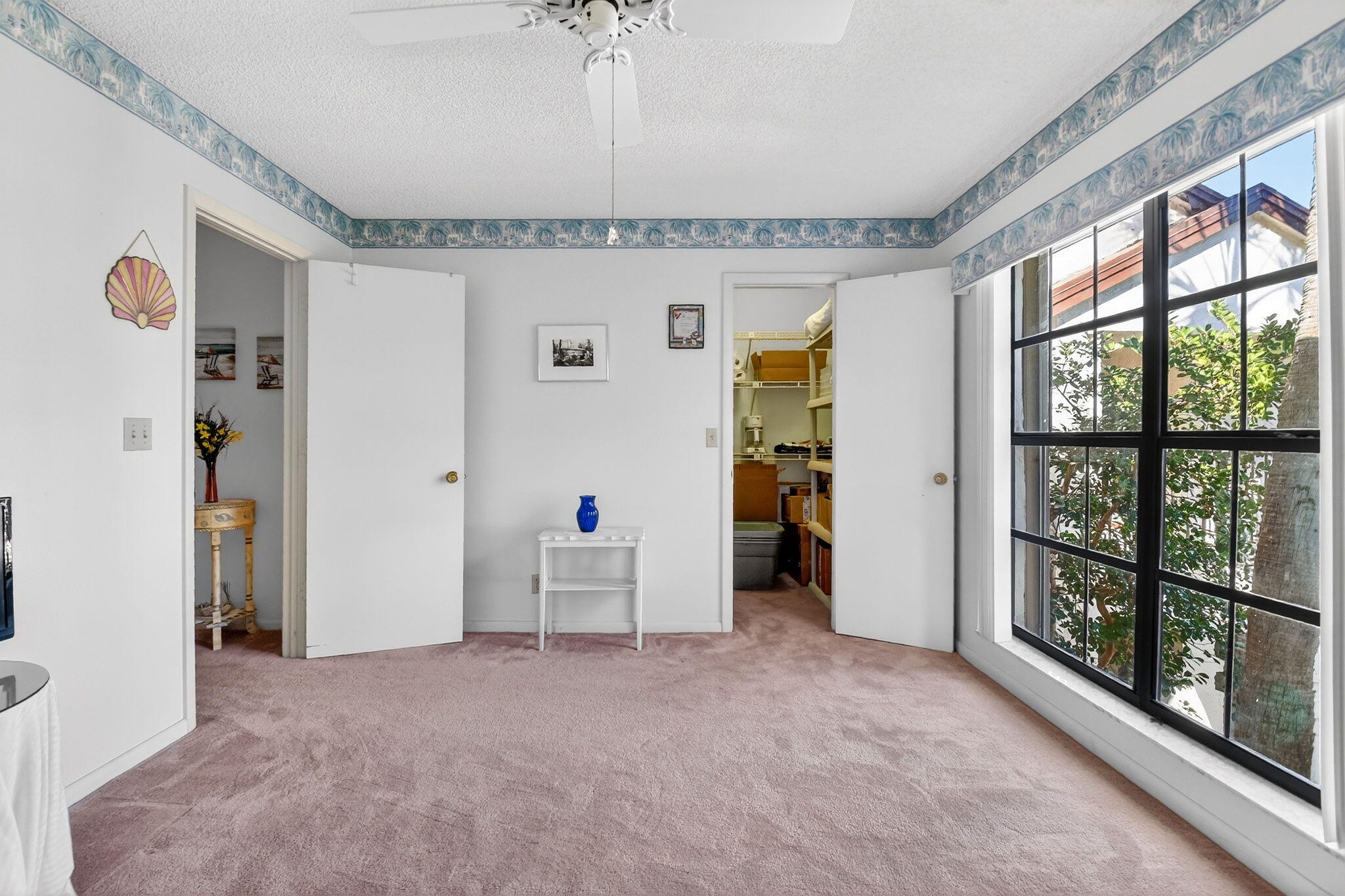 3227 Perimeter Drive Greenacres, FL 33467 - Photo 36 of 57 a view of empty room with floor to ceiling window