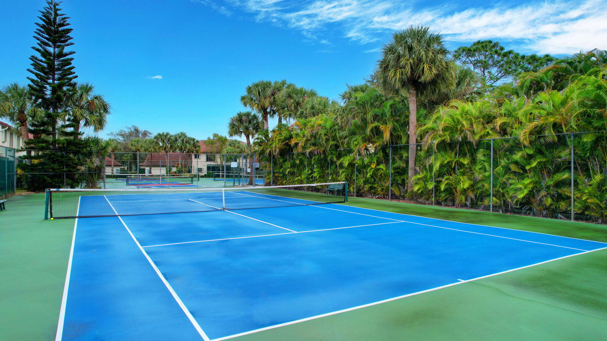 3227 Perimeter Drive Greenacres, FL 33467 - Photo 44 of 57 a view of an outdoor space and tennis court