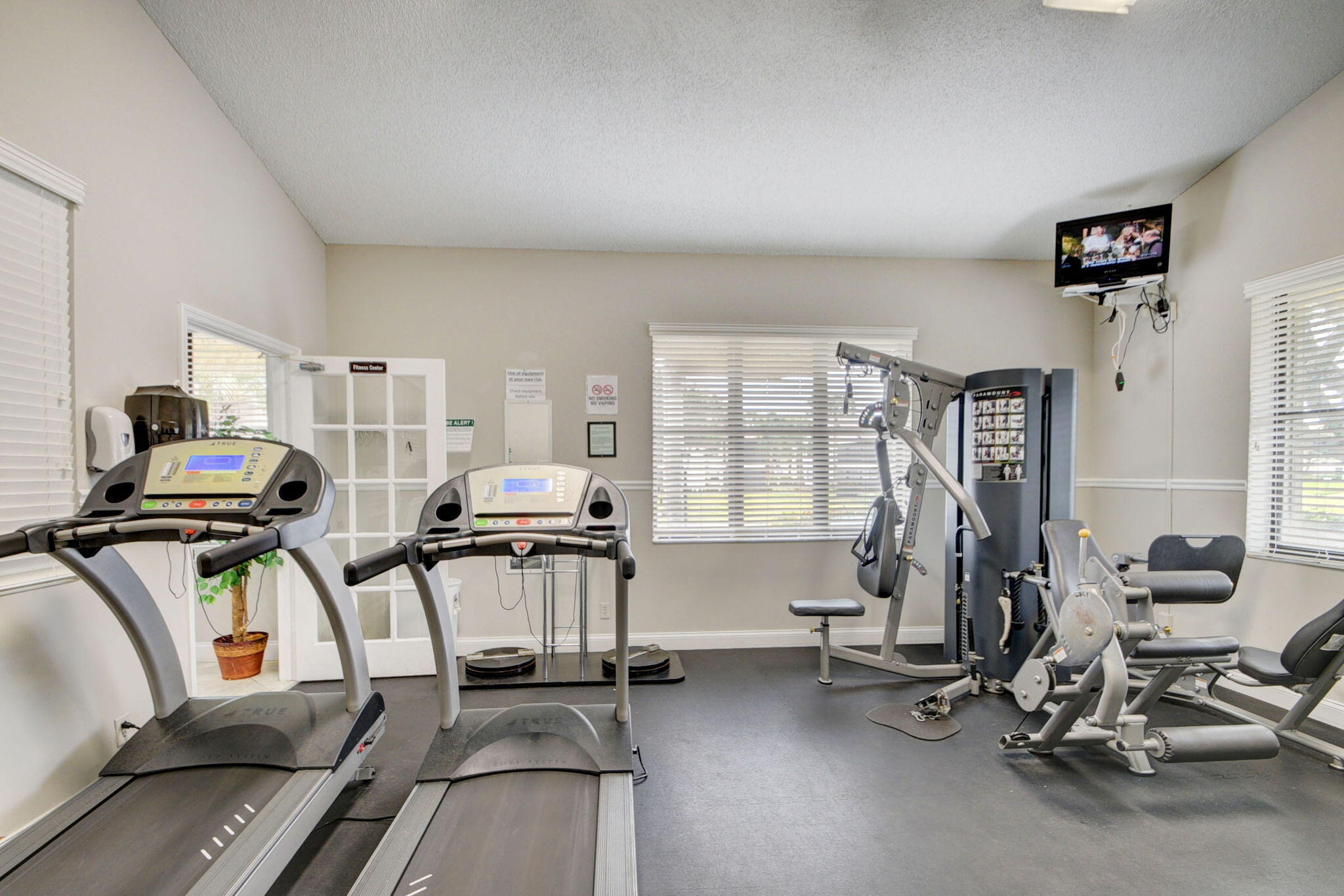 3227 Perimeter Drive Greenacres, FL 33467 - Photo 53 of 57 a view of a room with gym equipment