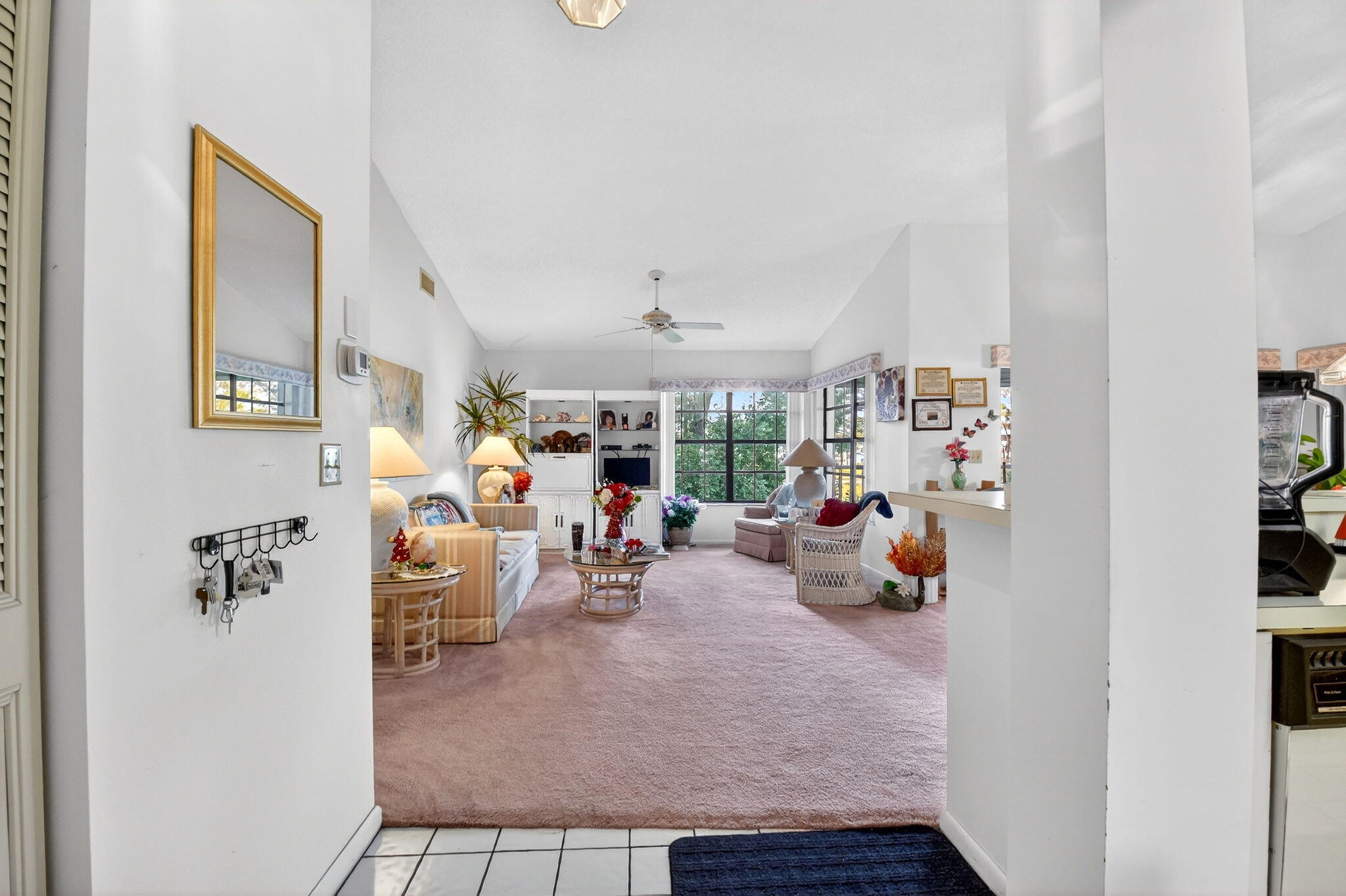 3227 Perimeter Drive Greenacres, FL 33467 - Photo 6 of 57 a view of a livingroom with furniture and a window