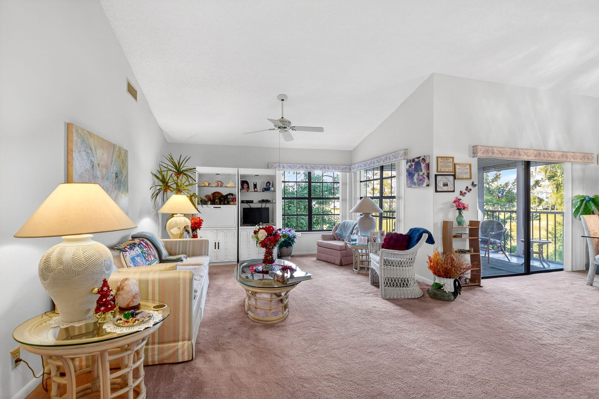 3227 Perimeter Drive Greenacres, FL 33467 - Photo 9 of 57 a living room with furniture and a flat screen tv