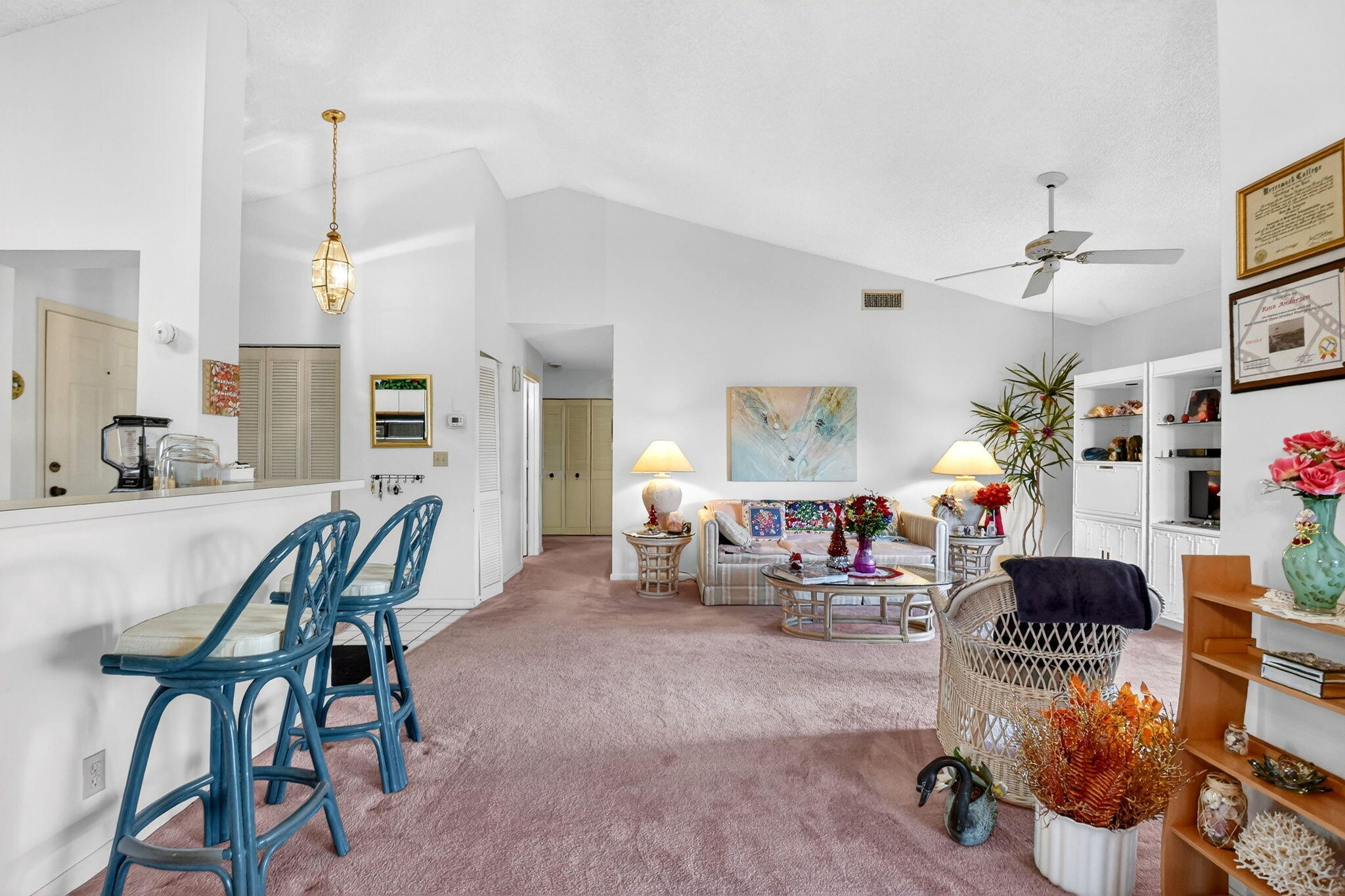 3227 Perimeter Drive Greenacres, FL 33467 - Photo 10 of 57 a living room with furniture and a chandelier