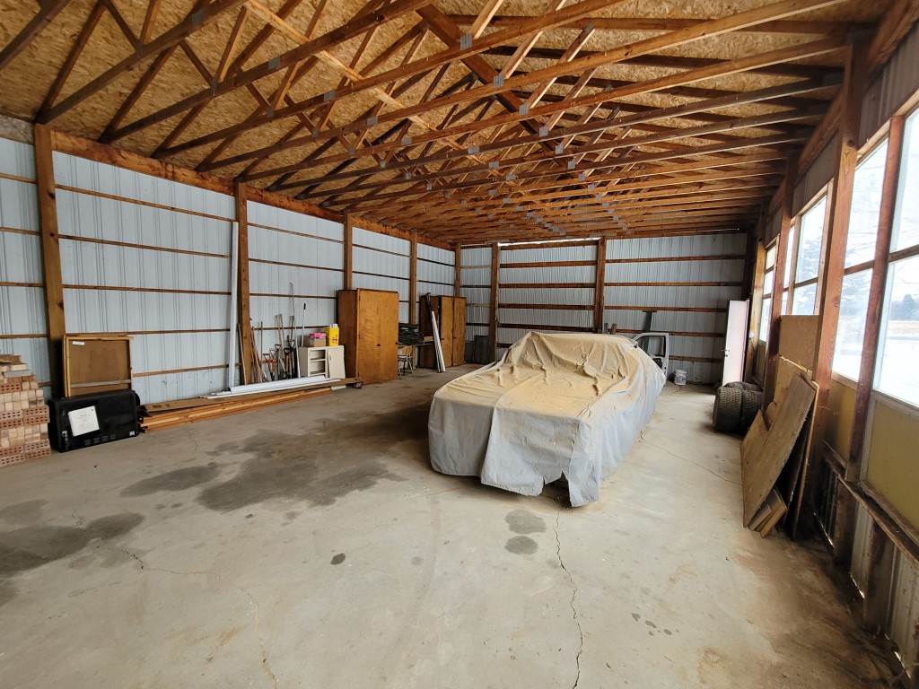 995 Richardson Road Owosso, MI 48867 - Photo 42 of 45 View of inside of Pole Barn 35 x 40 with a 12' Ceiling