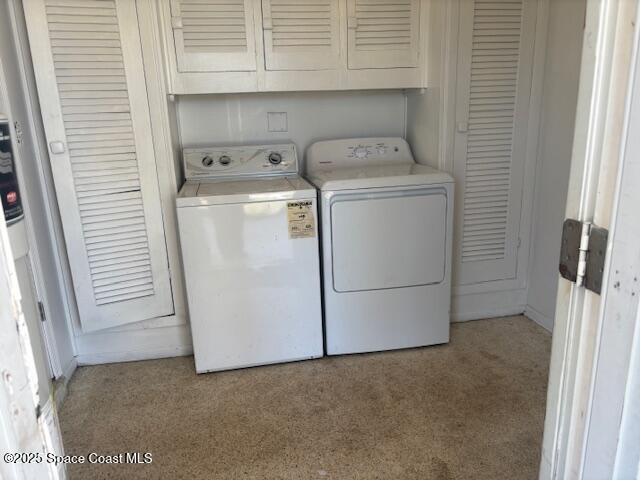 919 Darwin Lane Northeast Palm Bay, FL 32905 - Photo 4 of 14 a utility room with dryer and washer