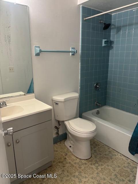 919 Darwin Lane Northeast Palm Bay, FL 32905 - Photo 7 of 14 a white toilet sitting next to a bath tub