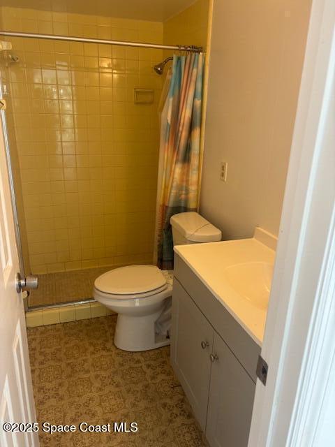 919 Darwin Lane Northeast Palm Bay, FL 32905 - Photo 8 of 14 a bathroom with a toilet and a shower