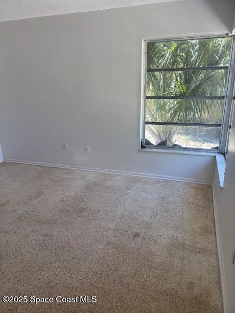 919 Darwin Lane Northeast Palm Bay, FL 32905 - Photo 9 of 14 a view of a room that has a window in it