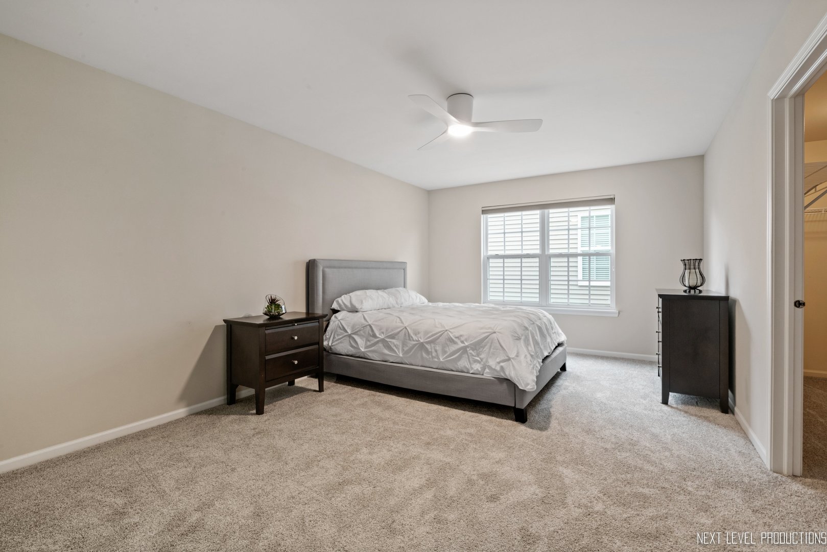 1659 Briarheath Drive Aurora, IL 60505 - Photo 19 of 29 a bedroom with a bed and a window