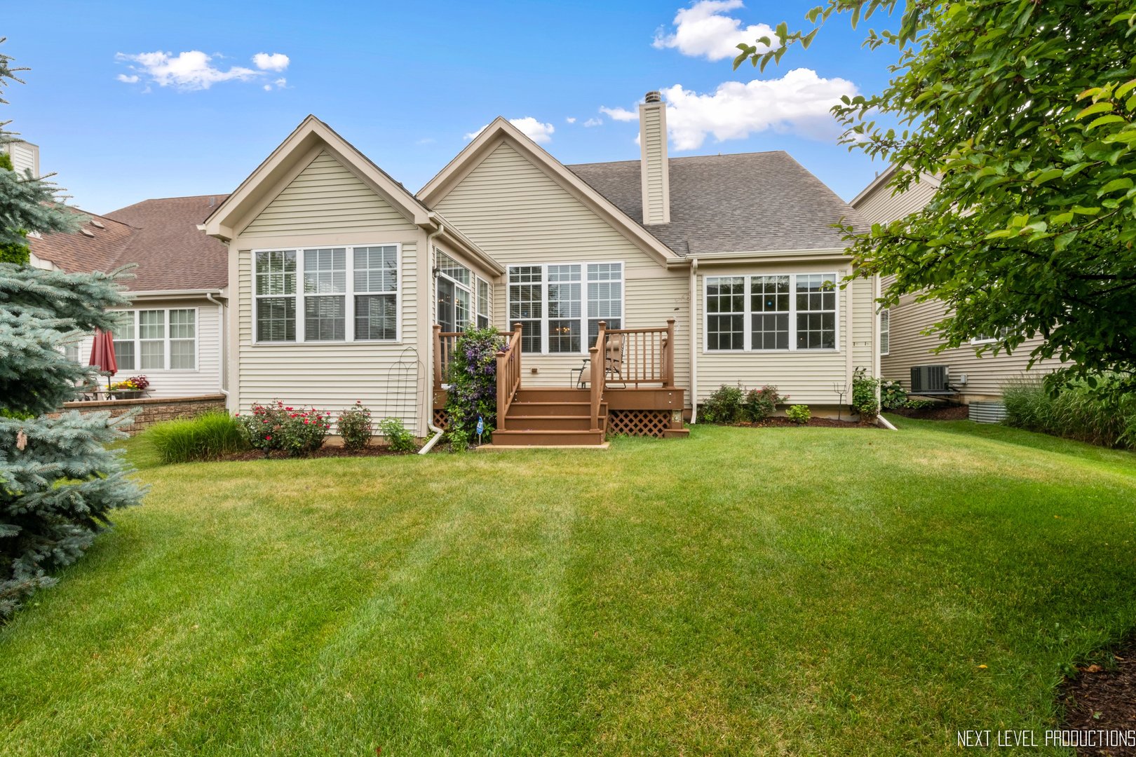 1659 Briarheath Drive Aurora, IL 60505 - Photo 26 of 29 a front view of a house with a garden