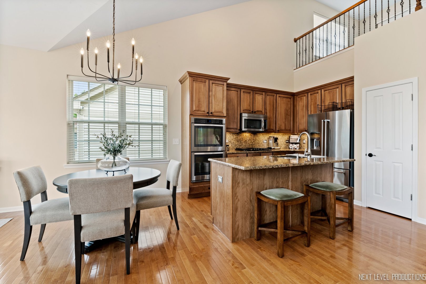 1659 Briarheath Drive Aurora, IL 60505 - Photo 8 of 29 a view of a dining room with furniture window and wooden floor